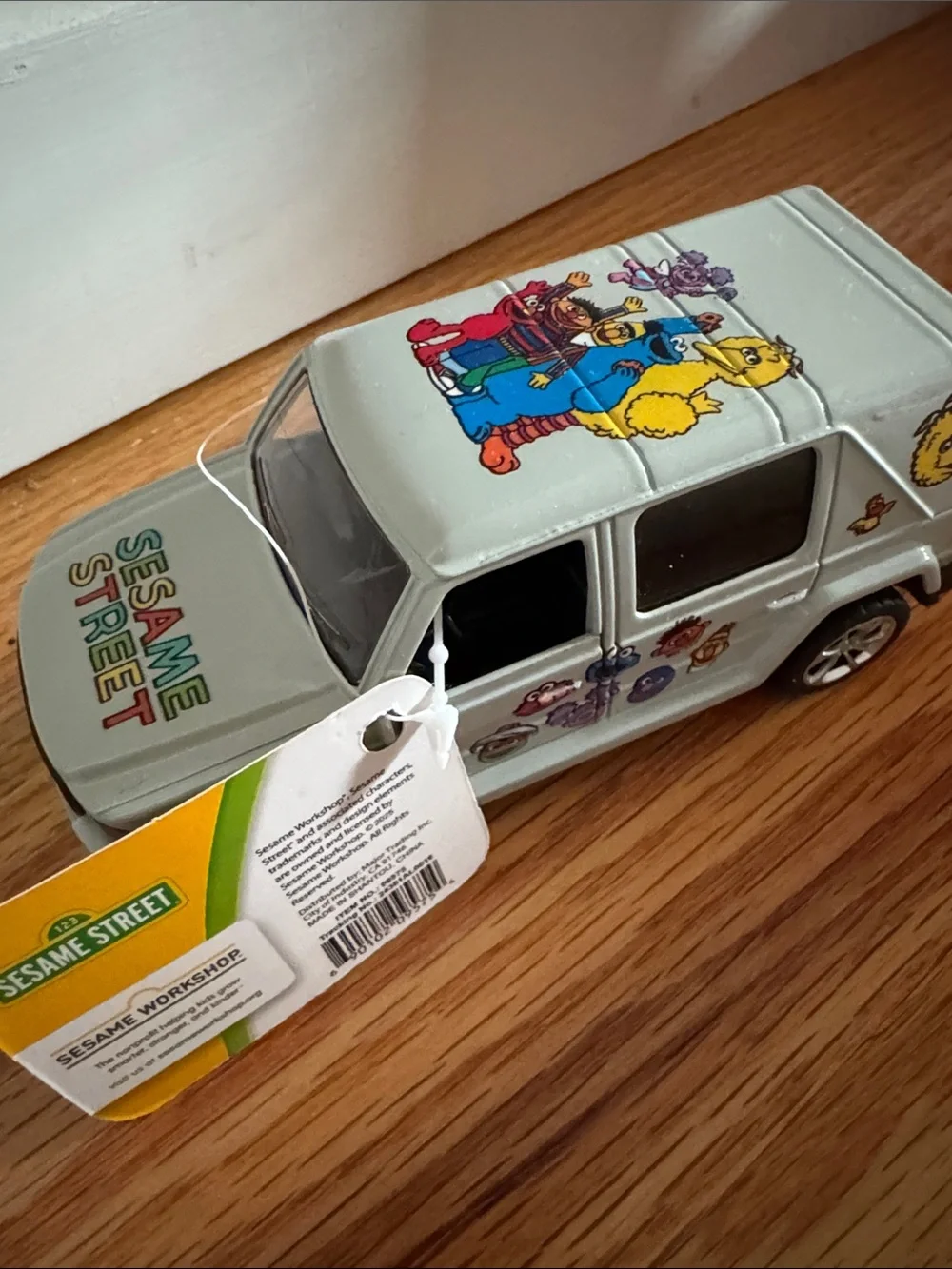Sesame Street Silver Mini Van with Colorful Character Art doors open NEW w tags